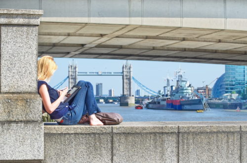 girl sitting and reading a book